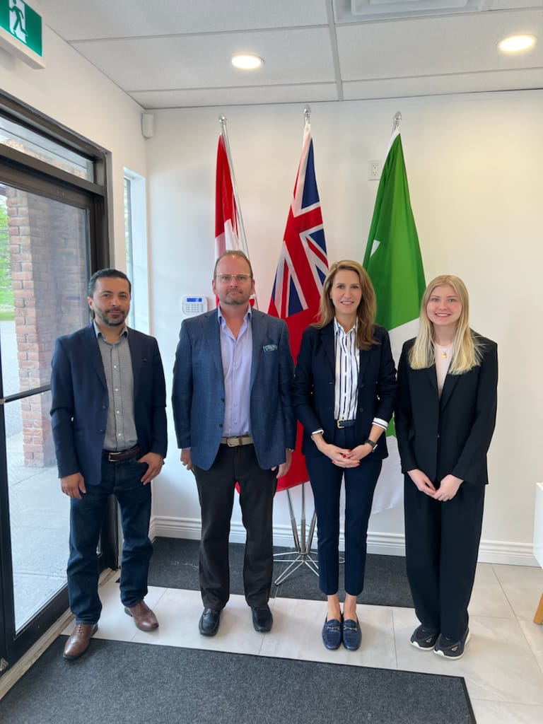  Dr. Brian Taylor and MPP Caroline Mulroney discussing the importance of addiction treatment and support for the
community.